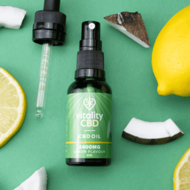 Vitality CBD Oral Drops 2400mg lemon coconut green background with pipette