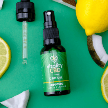Vitality CBD Oral Drops 4800mg lemon coconut green background with pipette