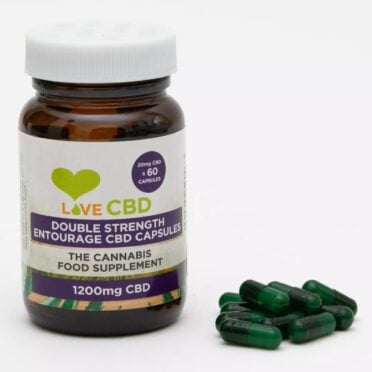 Love CBD Entourage Capsules Double Strength capsules beside white background
