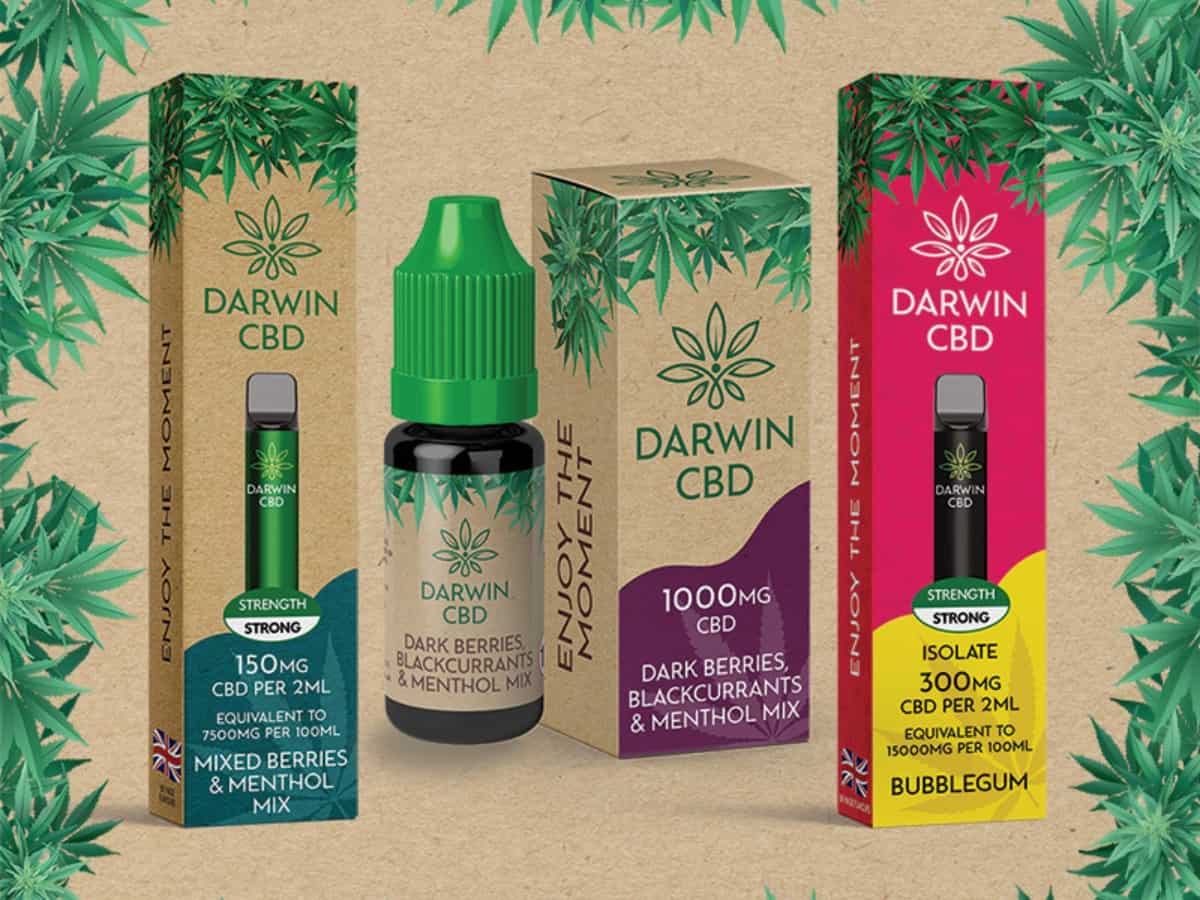 Darwin CBD e-liquid and disposable vape pen with brown background weed leaves