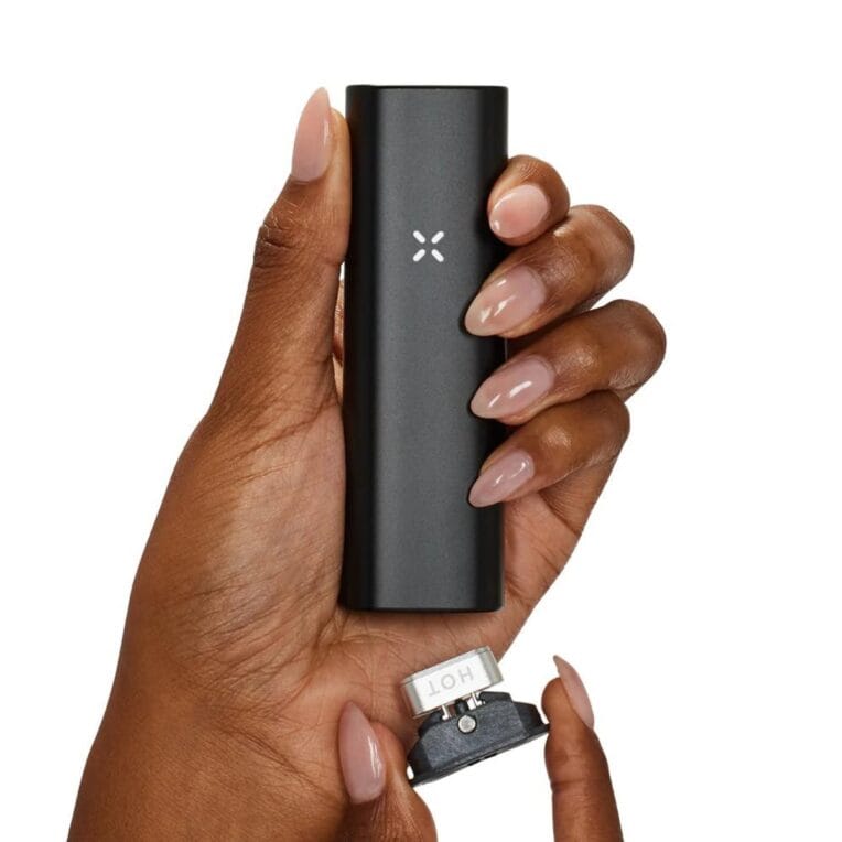 PAX-Plus-Onyx-in-hand-with-concentrate-insert