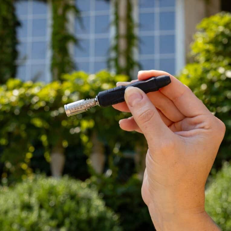 Holding Dynavap B2 at the park